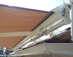 mitjavila-semi-cassette-awning-manual-white-frame-with-tan-tibelly-fabric-b