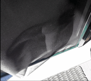 retractable-screen-mesh-damaged-by-large-dog