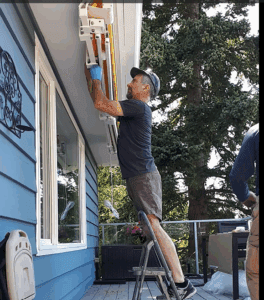 soffit-mounted-yellow-and-white-awning-installation