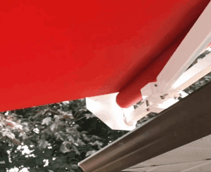 white-frame-red-fabric-roof-mounted-awning